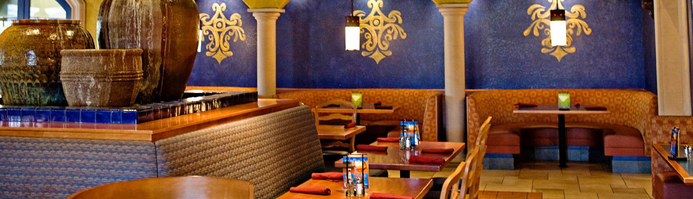Interior shot showing tables and decorations inside a Miguel's Restaurant